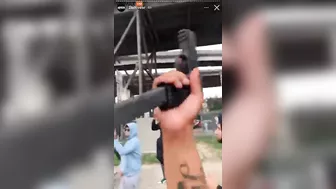 Gang Members Openly Display Weapons In The Middle Of The Street