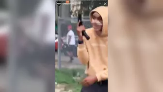 Gang Members Openly Display Weapons In The Middle Of The Street