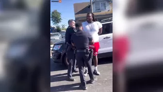 Los Angeles Police Officer Punches Handcuffed Man In Face