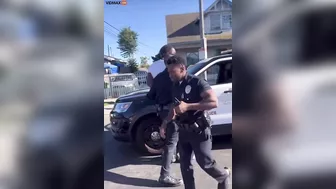 Los Angeles Police Officer Punches Handcuffed Man In Face