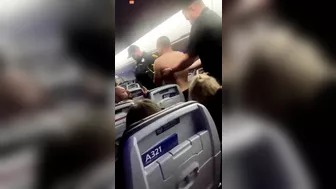 New Jersey Man Tries To Open American Airlines Door