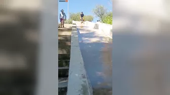 Man Transforms Into Accordion While Sliding Down Slide