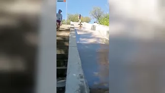 Man Transforms Into Accordion While Sliding Down Slide