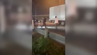 Two Police Officers Have A Tough Time With A Truck Driver Who Doesn't Seem To Be Concerned