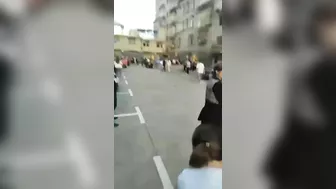 Balcony Collapse Nearly Kills Two Passers-by