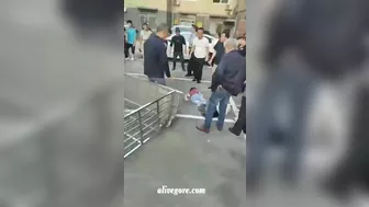 Balcony Collapse Nearly Kills Two Passers-by