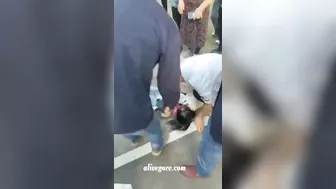 Balcony Collapse Nearly Kills Two Passers-by