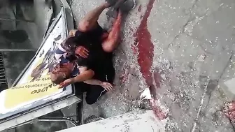 A Man Hugs The Body Of His Wife Who Died In The Accident
