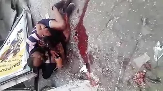 A Man Hugs The Body Of His Wife Who Died In The Accident