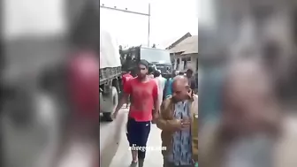 A Military Truck Drags A Woman Lying Under Its Wheels A(1)