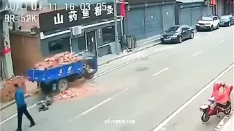 A Truck Loaded With Bricks Crushed The Driver