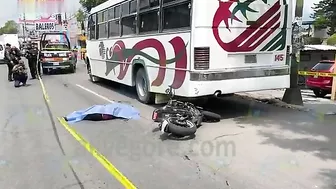 Cyclist Rams Parked Bus And Is Run Over By Truck