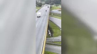 Cyclist Pushed Off Overpass By Truck