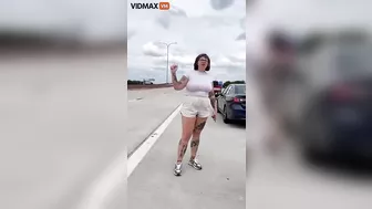 Tall Tattooed Girl Slams Another Driver And Is Caught On Video