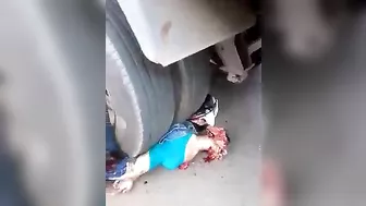 Woman Trapped Under Truck