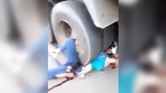 Woman Trapped Under Truck