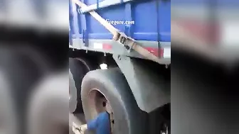 Woman Trapped Under Truck