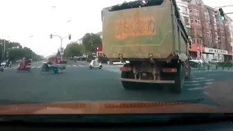 Chinese Garbage Truck Kills Scooter Rider