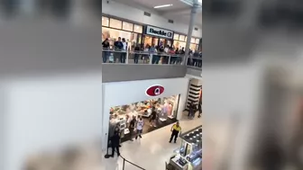 A Large Piece Of Glass Falls From A Shopping Mall Roof Onto A Man In AR