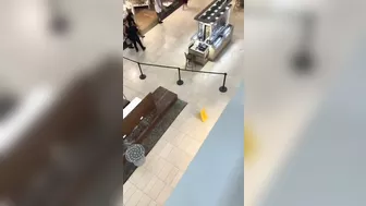 A Large Piece Of Glass Falls From A Shopping Mall Roof Onto A Man In AR