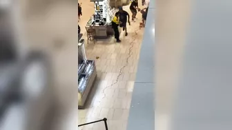 A Large Piece Of Glass Falls From A Shopping Mall Roof Onto A Man In AR