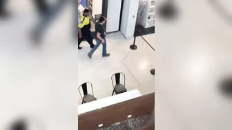 A Large Piece Of Glass Falls From A Shopping Mall Roof Onto A Man In AR