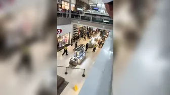 A Large Piece Of Glass Falls From A Shopping Mall Roof Onto A Man In AR