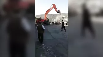 Man Destroys 5 Trucks With Excavator After Uncle Refuses