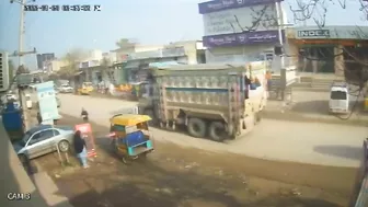 Motorcyclist Falls Directly Under The Wheels Of The Truck