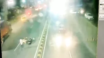 Motorcyclist's Head Crushed By Trailer