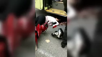 Motorcyclist's Head Crushed By Bus Wheel