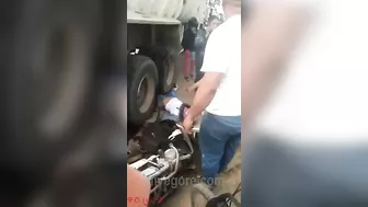 Motorcyclist's Legs Crushed By Truck Wheel