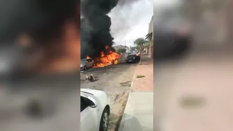 The Aftermath Of A Plane Crash On A Residential Street