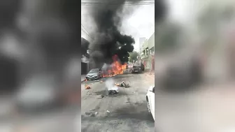 The Aftermath Of A Plane Crash On A Residential Street