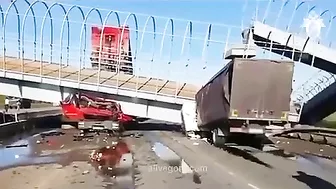 Dump Truck Driver Forgets To Lower The Body