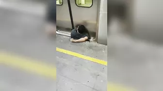 Man Squeezed Between Platform And Train