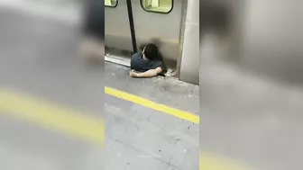 Man Squeezed Between Platform And Train