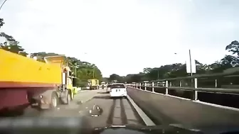 The Moment The Motorcyclist Fell Under The Wheels Of A Tractor