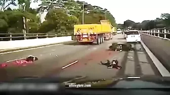 The Moment The Motorcyclist Fell Under The Wheels Of A Tractor