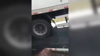 Motorcyclist's Remains Under Truck Wheels