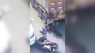 A Motorcyclist Was Pinned Under A Truck After It Ran Over His Legs