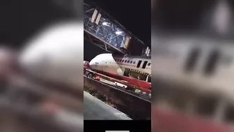 Truck Carrying Plane Body Hits Pedestrian Bridge