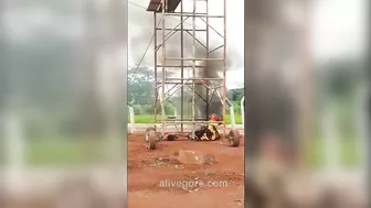 Two Workers Were Electrocuted When They Pushed The Tower To Collapse.