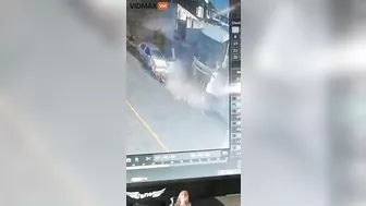Woman Hit By Brick Wall After Bus Overturns - Video