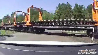 Semi Truck Tries To Drive Over Train Tracks