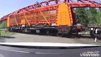 Semi Truck Tries To Drive Over Train Tracks