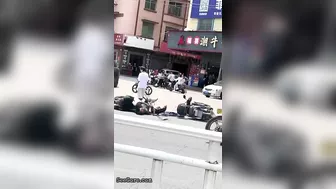 A Cyclist Without A Helmet Knocked Down Another Cyclist At An Intersection-01