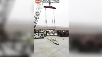 Construction Worker Has Near Collision With Crane