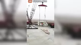 Construction Worker Has Near Collision With Crane