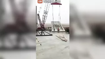 Construction Worker Has Near Collision With Crane